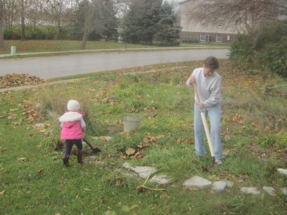 Grammy and Brenna hard at work digging up flowers! 