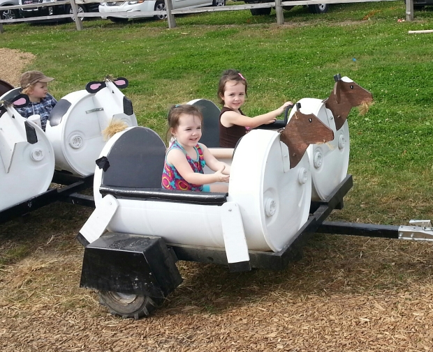 Riding around in an animal-themed tractor/train thing.