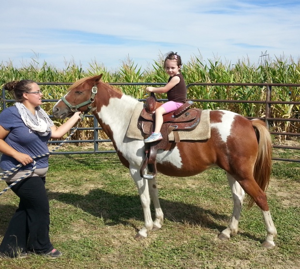 Surprisingly, Brenna (the child who has always been petrified of being up-close with animals) wanted to ride a horse. She loved it!