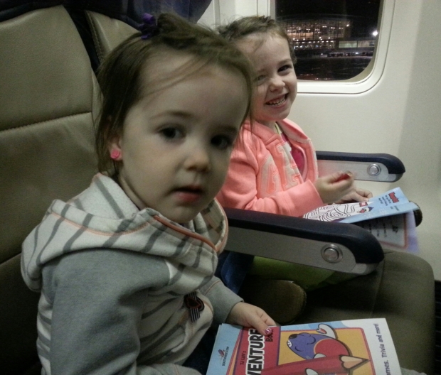 On the plane and ready for take-off (after waking up at about 4am).