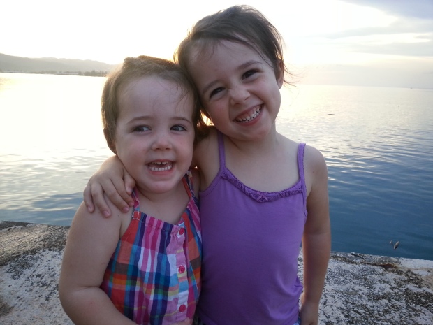 The two cutest sisters in the world, enjoying one last Jamaican sunset.